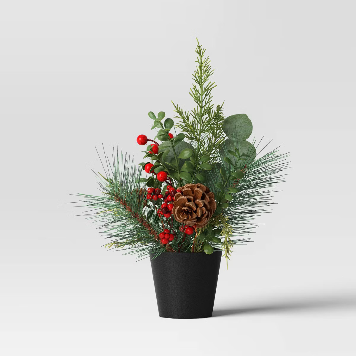 14" Potted Mixed Greenery with Pinecones & Berries Christmas Artificial Plant Arrangement - Wonde... | Target