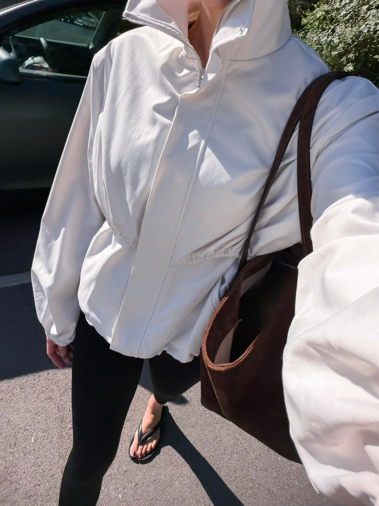 Pilates outfit 

Ezrah Funnel neck jacket Sundays the Label  - size small 
Little LIFFNER brown suede tote bag 
Spanx booty boost gym black leggings 7/8 - size small
Jeffrey Campbell Tabi flip flops