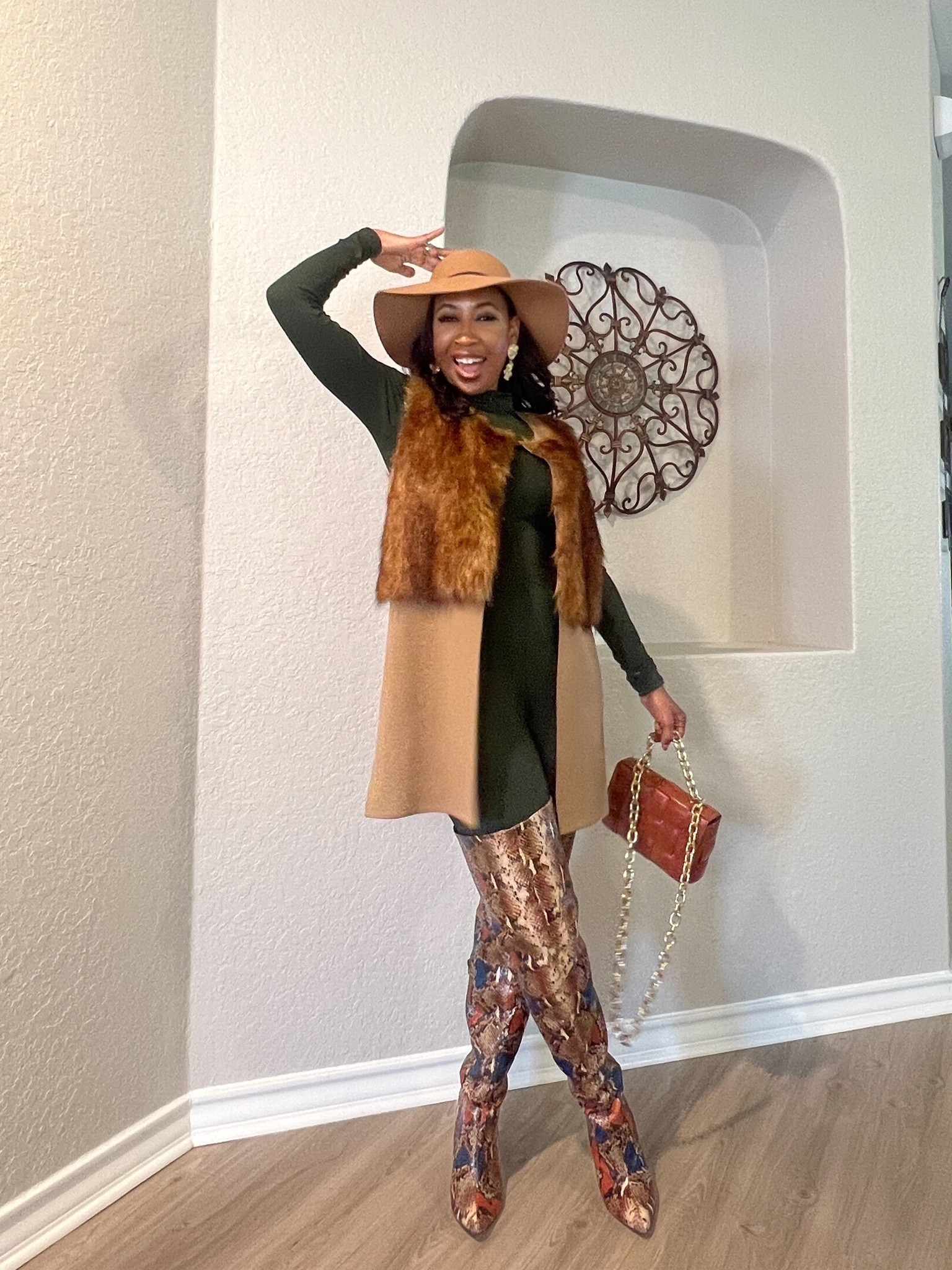 Channeling my inner fashion chameleon with this bold ensemble! 🐍 Mixing patterns and textures like a pro, because life is too short to blend in. Who else is ready to slay in thigh high boots, faux fur, and a chic bodysuit? 🍂💋

(Note: The vest and boots are at least 5 years old. Attempted to find and link similar options.)

#fallfashion #boots #thanksgivingoutfit #holidayoutfits #falloutfits

#LTKfindsunder50 #LTKover40 #LTKstyletip