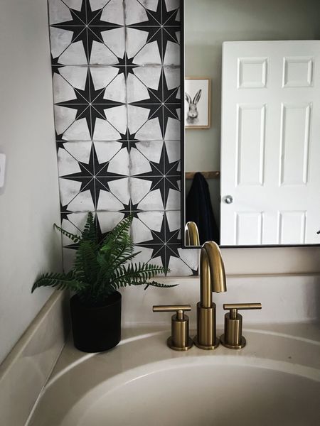 I just updated the boys bathroom with some new finishes. 
First, I tried out this peel n stick tile from Amazon.  What do you all think?!  Love how easy it sticks to the wall!  I also had a handyman change out the faucets.  It was an easy update, but I didn't want to add to the hubbies list 😜.

Everyday tote
Women’s leggings
Women’s activewear
Spring wreath
Spring home decor
Spring wall art
Lululemon leggings
Wedding Guest
Summer dresses
Vacation Outfits
Rug
Home Decor
Sneakers
Jeans
Bedroom
Maternity Outfit
Women’s blouses
Neutral home decor
Home accents
Women’s workwear
Summer style
Spring fashion
Women’s handbags
Women’s pants
Affordable blazers
Women’s boots
Women’s summer sandals
Spring fashion

#LTKstyletip #LTKSeasonal #LTKhome