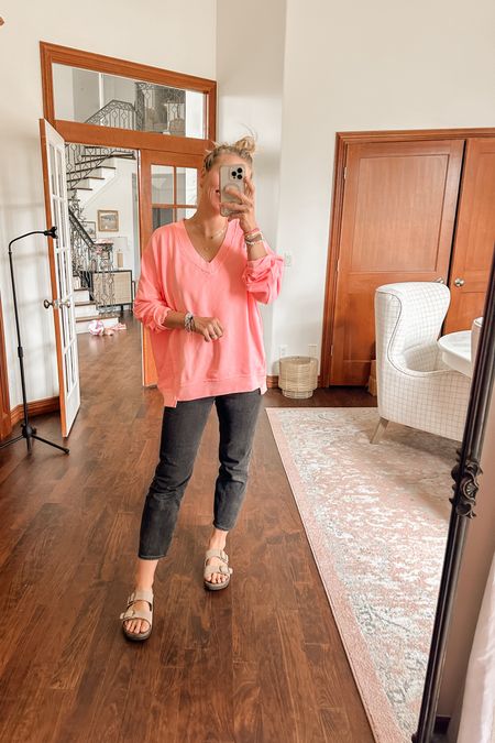 Wearing small in this pink pullover. Comes in lots of color! 