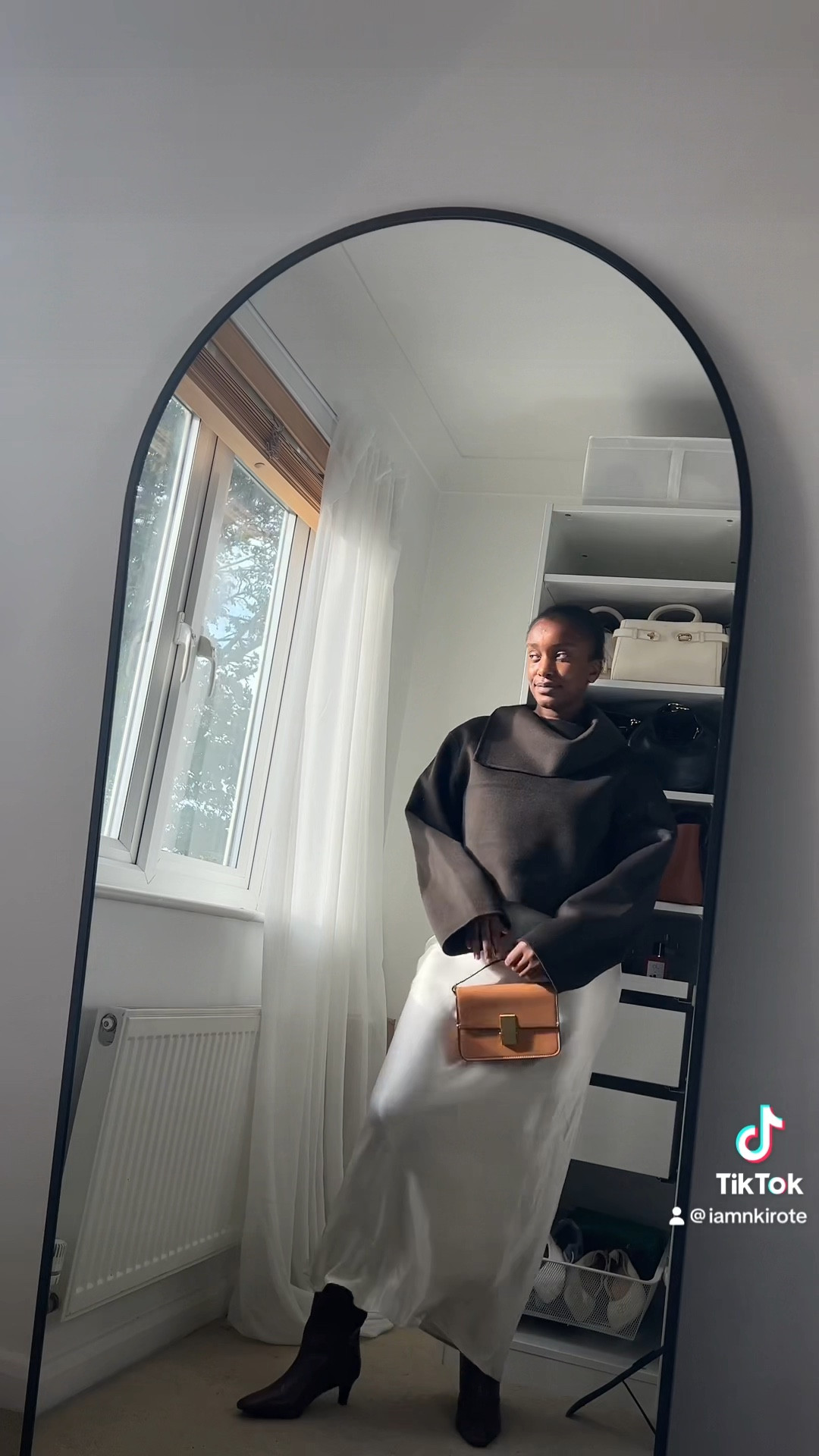 Satin skirt, oversized jumper, knee high boots , tan crossbody bag, statement jumper, fall outfit , maxi skirt 

#LTKSeasonal #LTKmidsize #LTKeurope