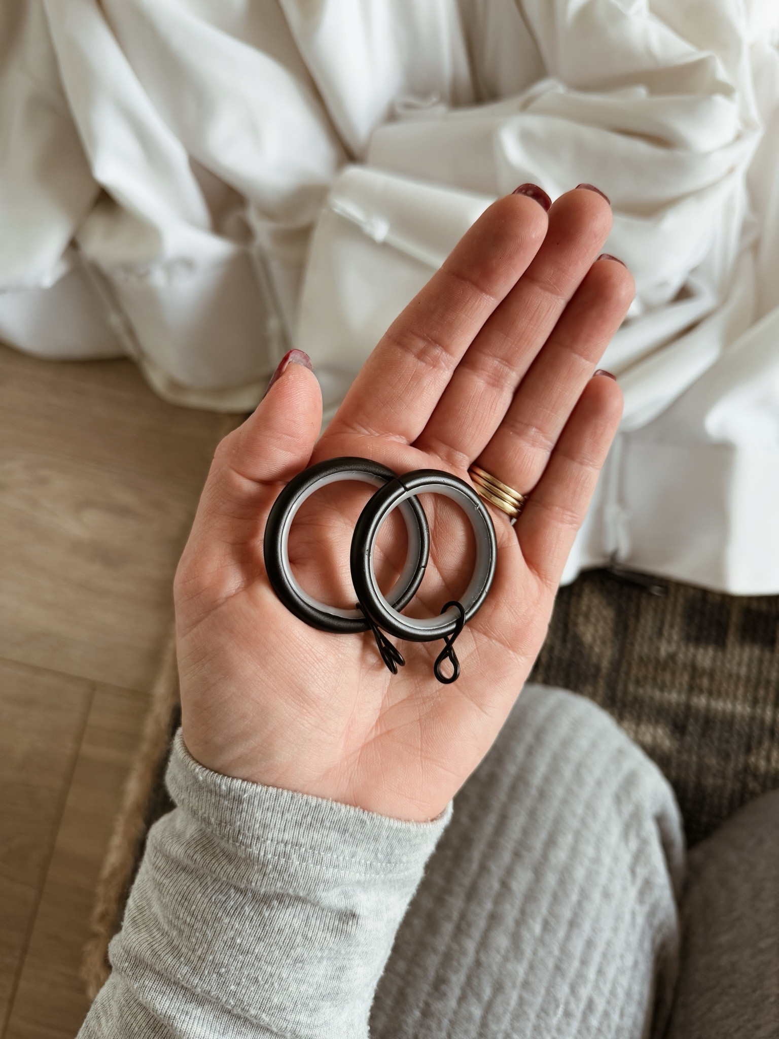 My favorite quiet curtain rings! They feature a plastic inside so they are quiet when you slide along a metal curtain rod  

#LTKHome #LTKFindsUnder50