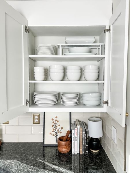 Simple white dishes organized in kitchen cabinet. These dinnerware sets are super affordable and are very thick and sturdy. I bought three sets so we’d have enough for big family dinners.

#LTKhome #LTKfamily #LTKSeasonal