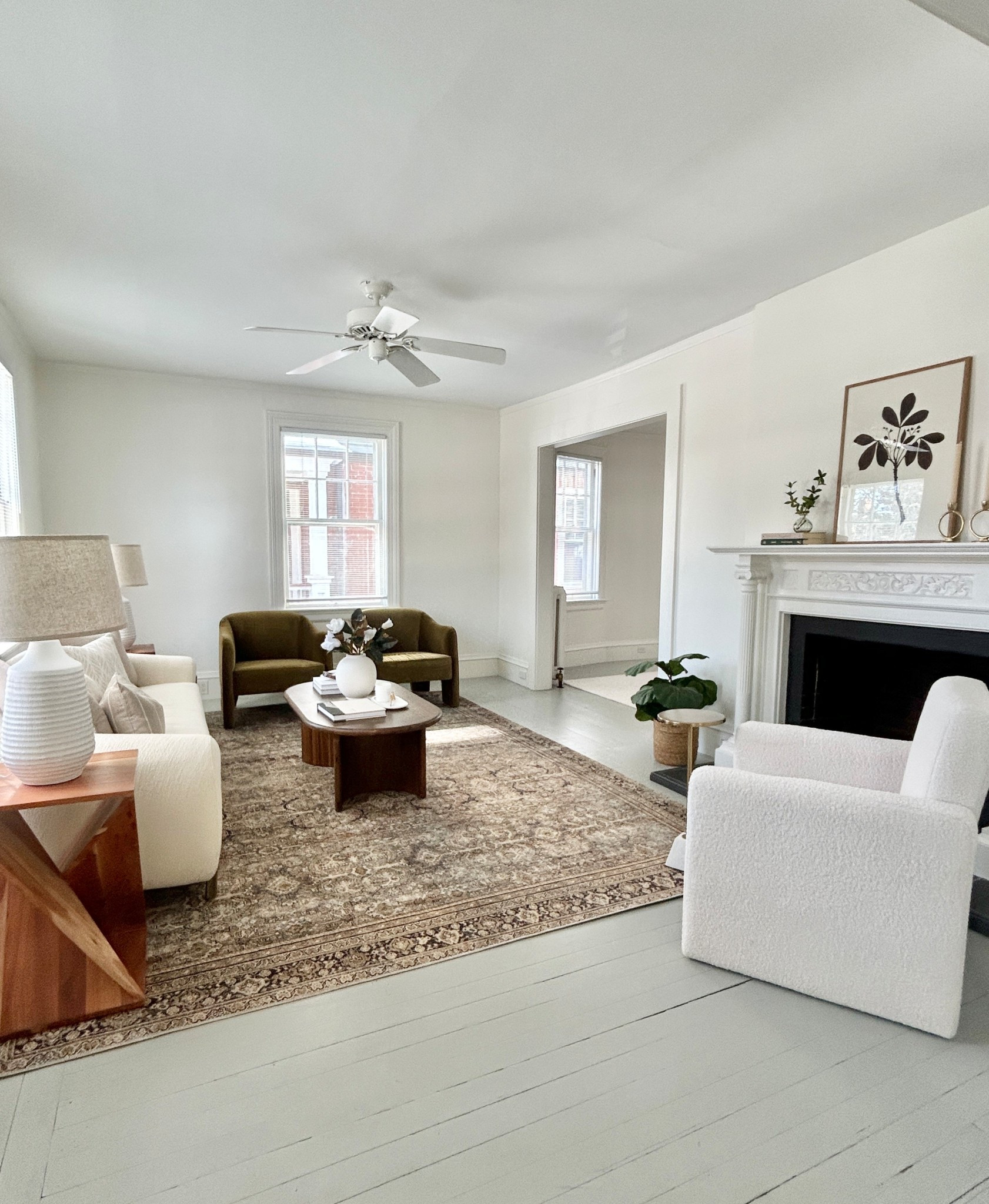 Bright living room with charcoal and olive green accents. 

#livingroom

#LTKHome