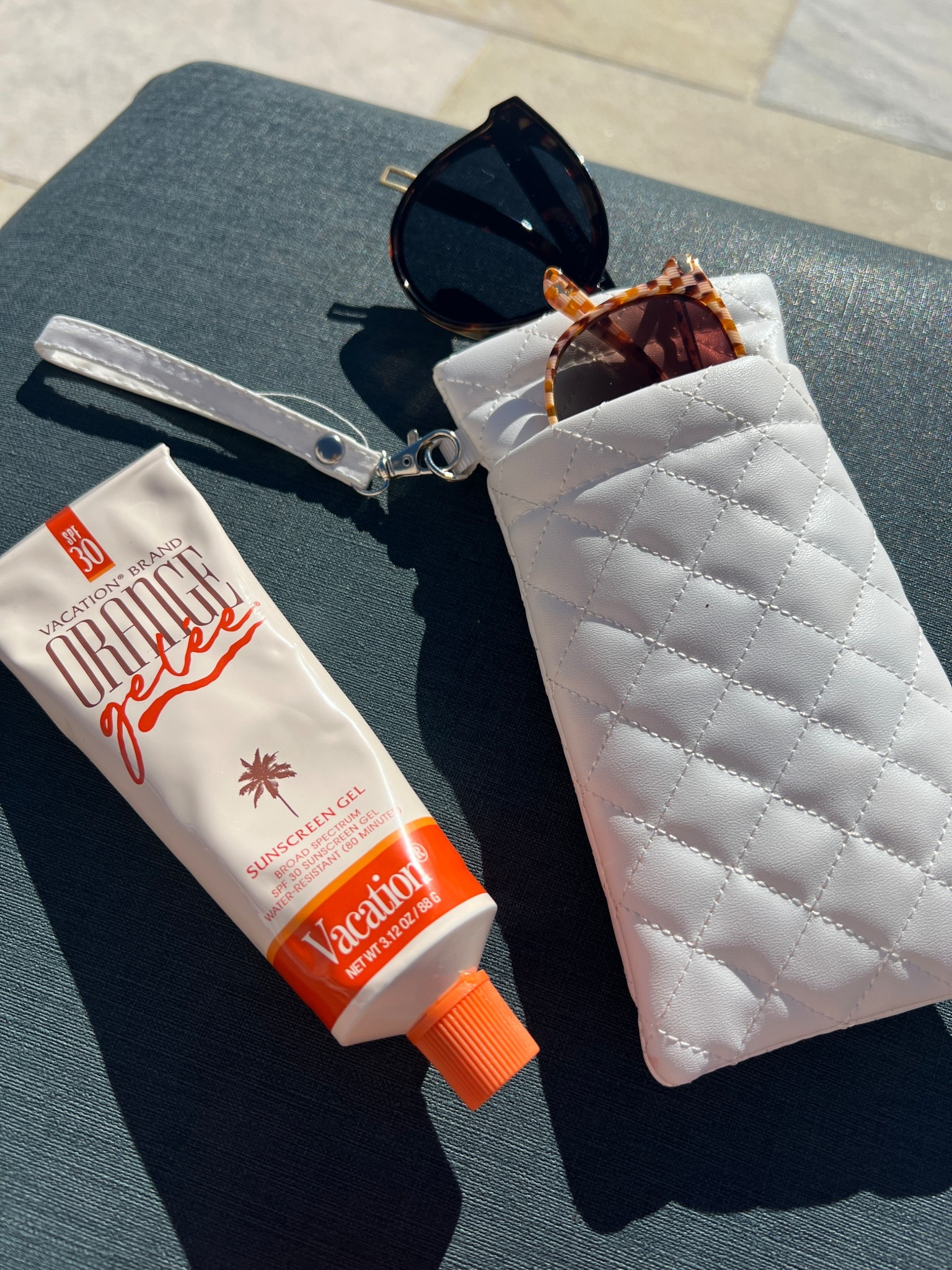 Two summer must haves: Orange gelee sunscreen & a double sunglass case 

#LTKStyleTip #LTKSeasonal #LTKTravel