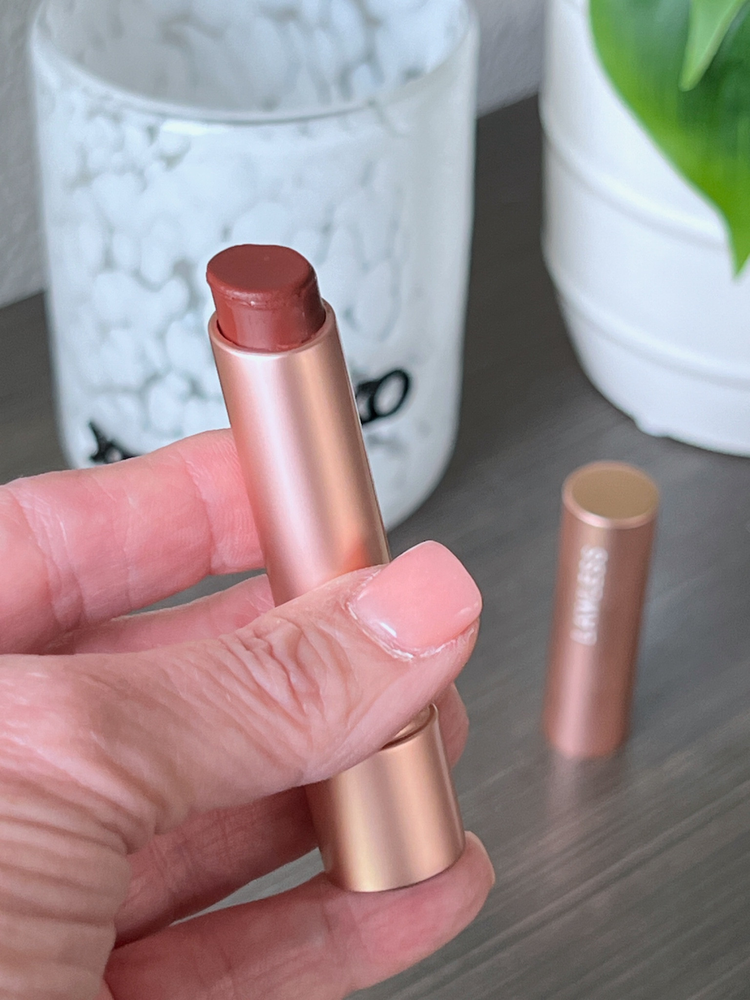 Clean beauty brand Lawless has nice lip plumping lip balms that give a nice amount of color to the lips. This is the shade Sugarplum which is a universal warm berry for any time of the year. Many shades available.
#makeupmusthave #beautyover50 #lipcare #productreview

#LTKBeauty #LTKSeasonal #LTKOver40