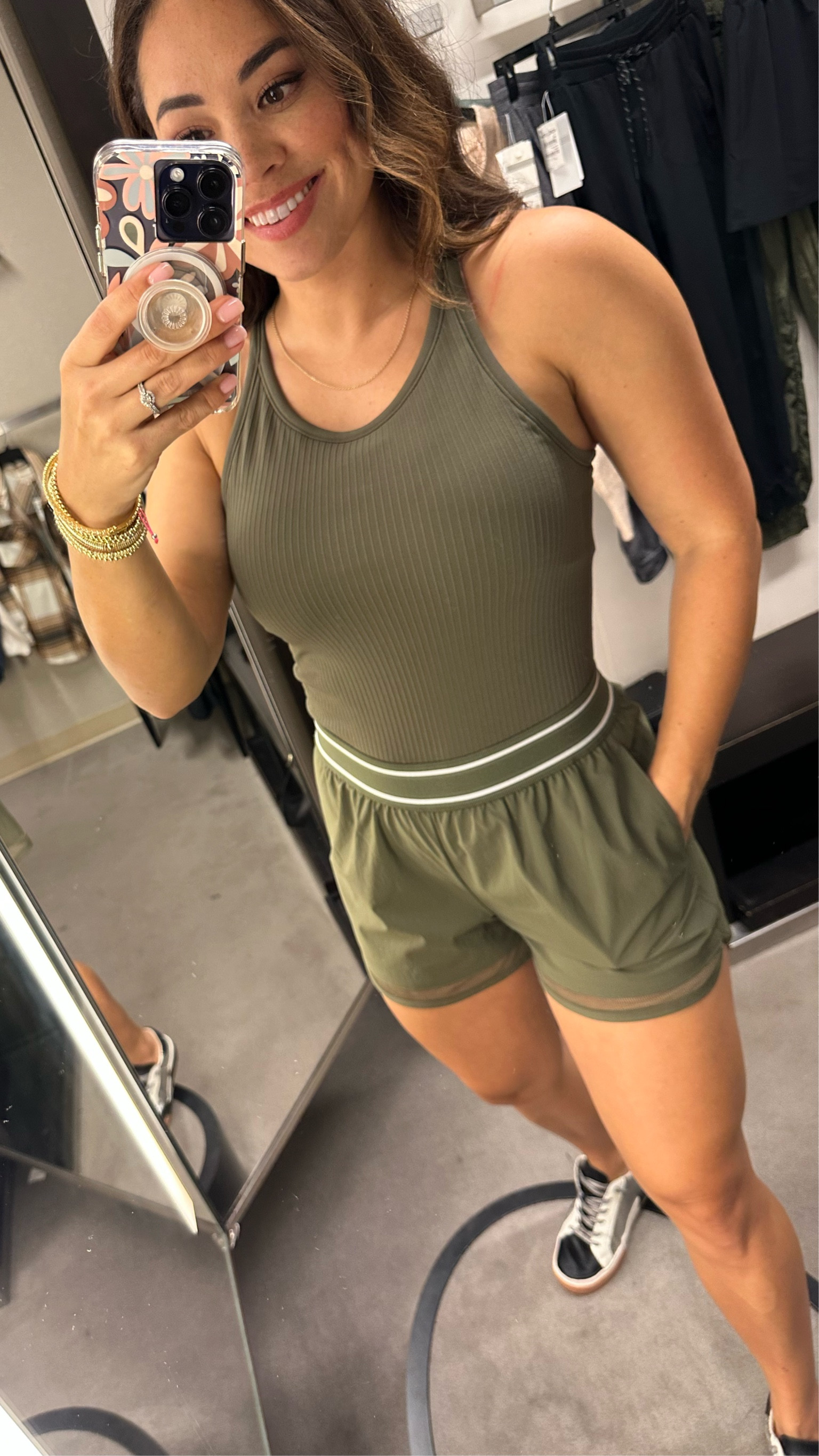 Loving this olive green color! These shorts are basic with a nice detail. This tank on repeat. 
#athleisure #fall 

#LTKSeasonal #LTKunder100