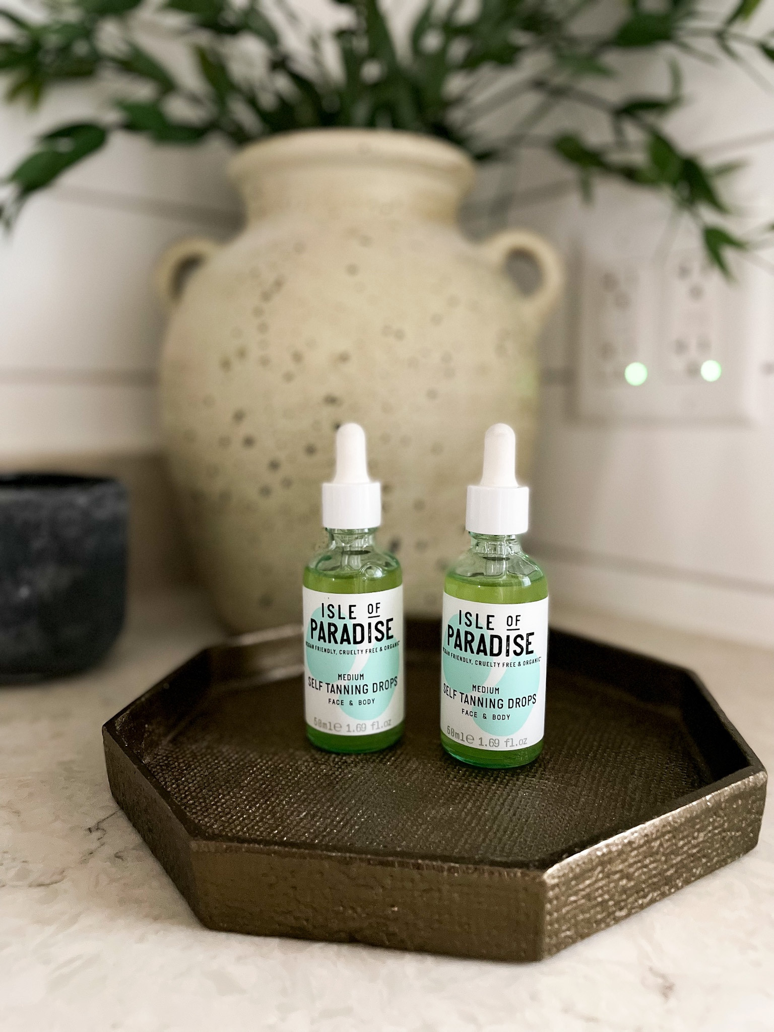 My favorite tanning drops of all time now come in a large size option! 🙌🏻 Y’all know I swear by these drops and this new promo on @qvc gives you more product plus you can use code SURPRISE for an additional $10 off if you’re a first time customer! I use the dark drops  the most but medium is the most universal color option. You can customize your tan with how many drops you add to your lotion. I have a whole tutorial saved to a highlight on my profile. #ad #loveqvc 

#LTKbeauty #LTKunder50