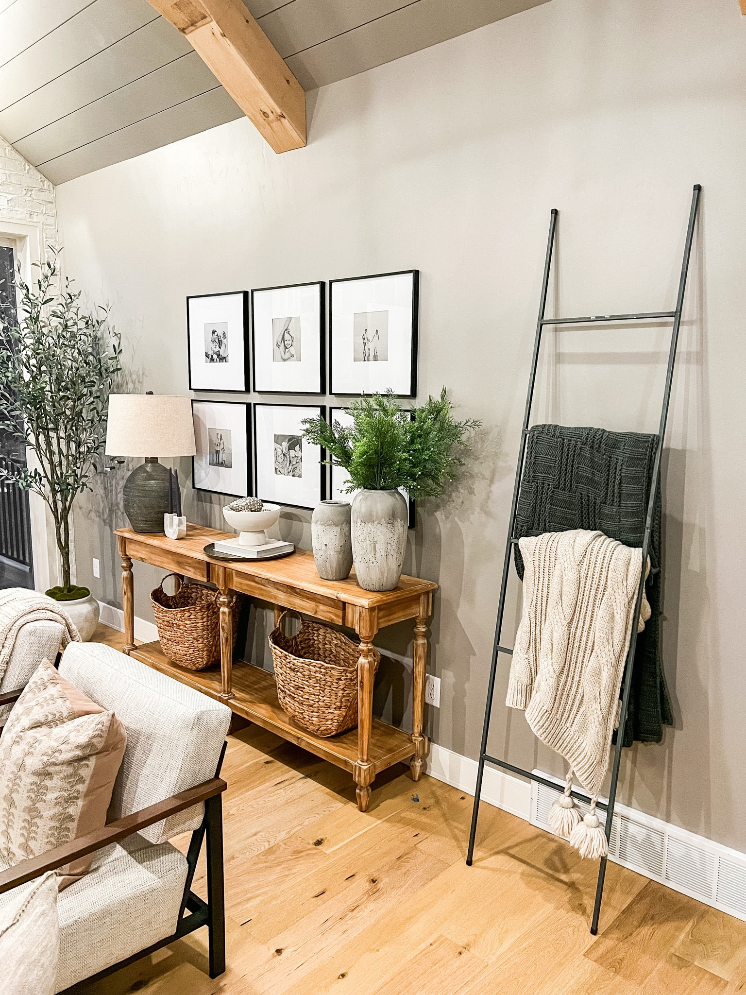 Living room decor - living room furniture - farmhouse living room - farmhouse decor - winter decor - gallery frames - blanket ladder - console table decor 

#LTKhome