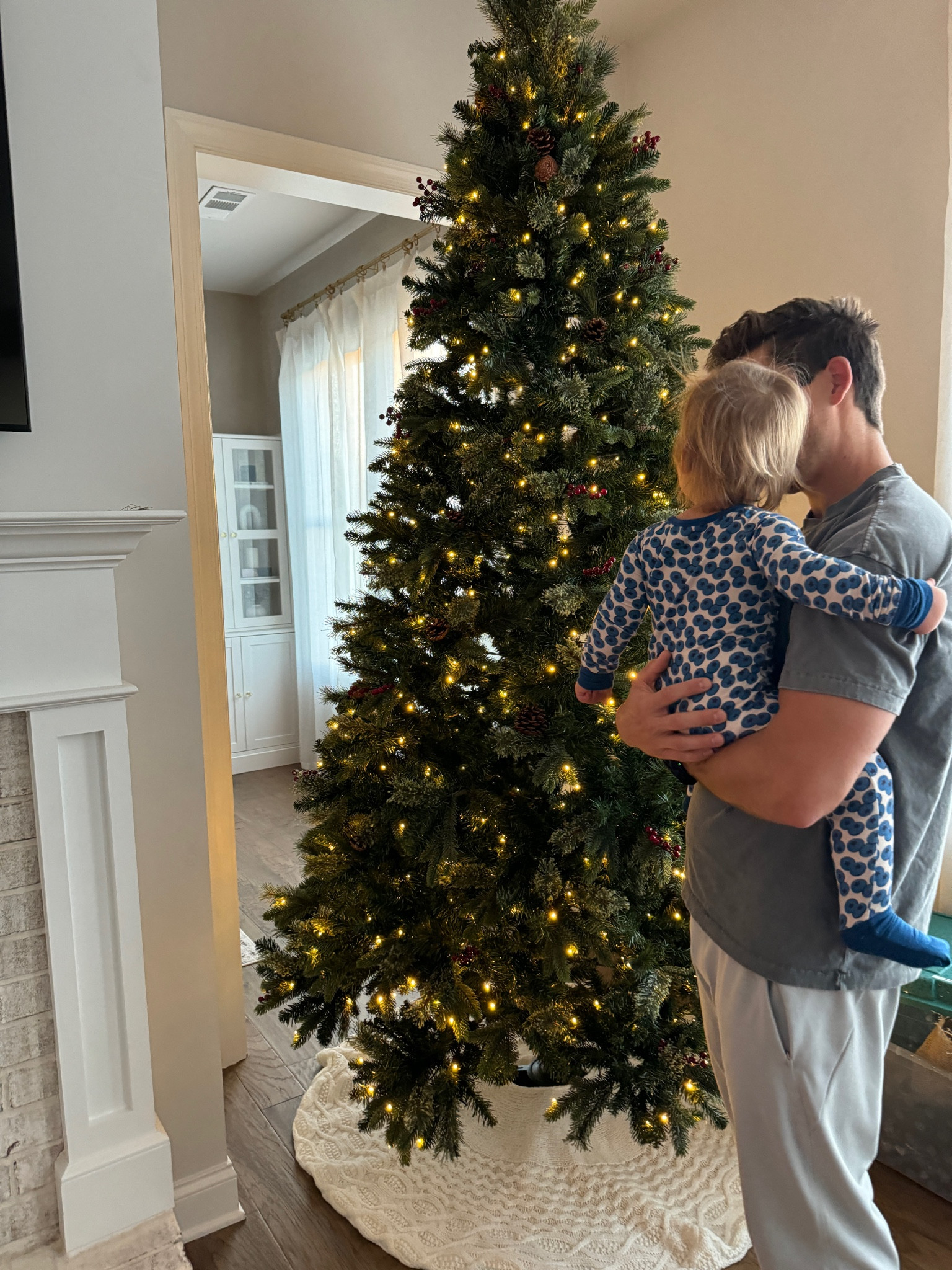 9ft pre lit Christmas’s tree with flocking and berry accents! We LOVE this tree and have had it for 2 years!

#LTKHoliday #LTKSeasonal