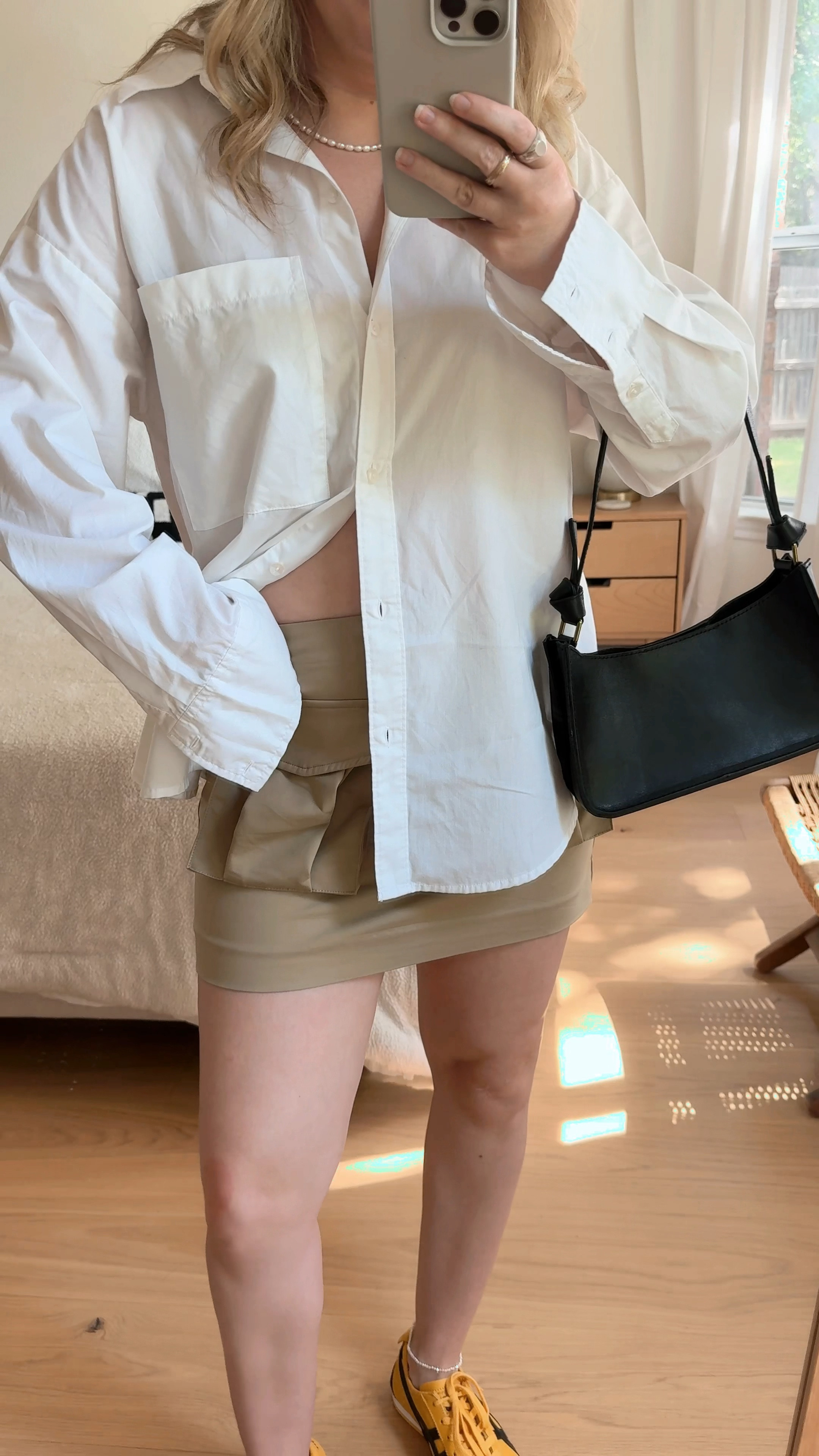 Two of my favorite ways to tone down a mini:
-an oversized button down
-flat sandals or sneakers

#LTKStyleTip #LTKVideo #LTKFindsUnder100