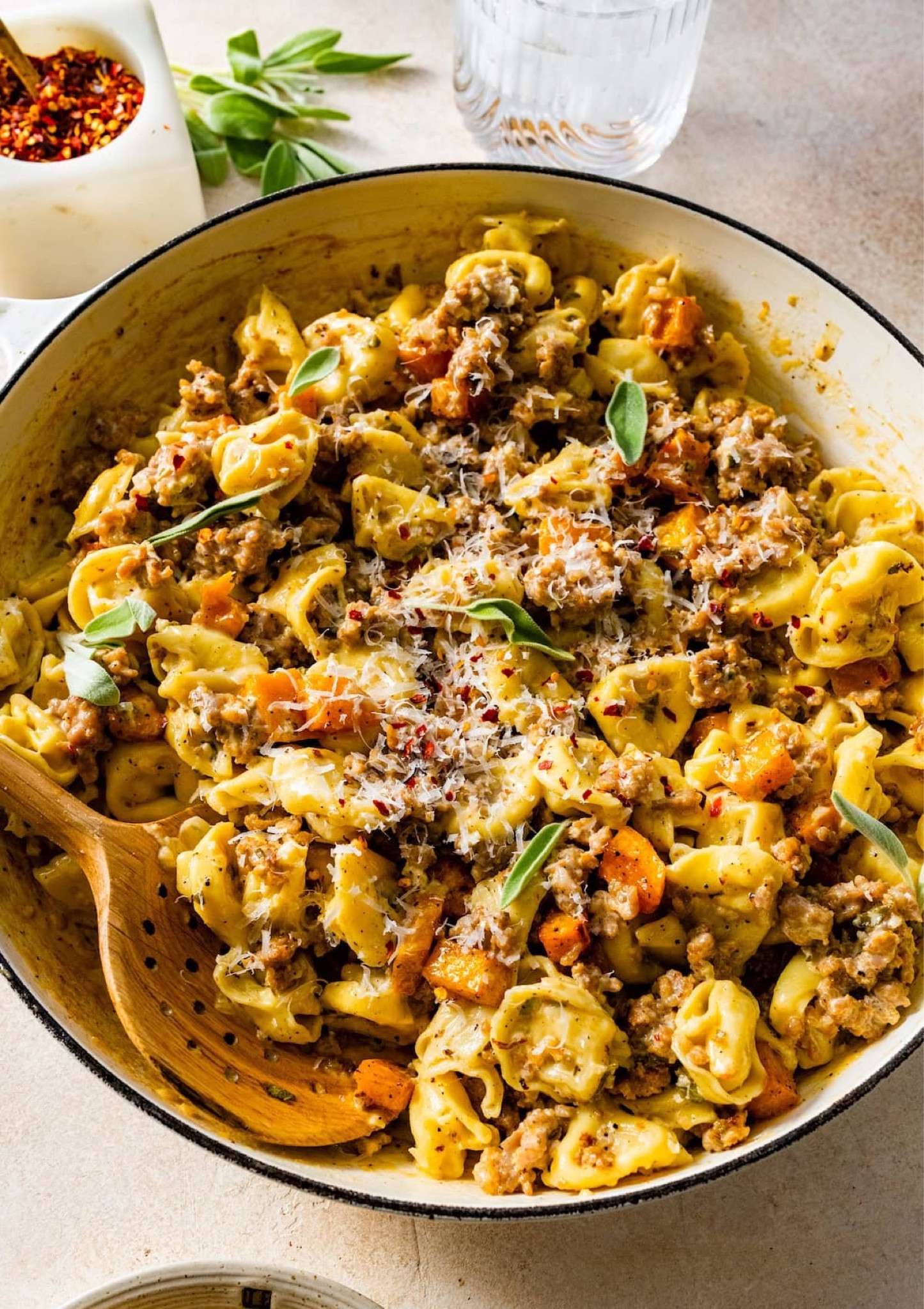 Creamy tortellini with butternut squash and Italian sausage is a comforting dish that combines the rich, savory taste of sausage with the sweet notes of roasted butternut squash, all enveloped in a creamy, luscious sauce. The perfect fall meal!

#LTKHome #LTKFindsUnder50 #LTKFindsUnder100