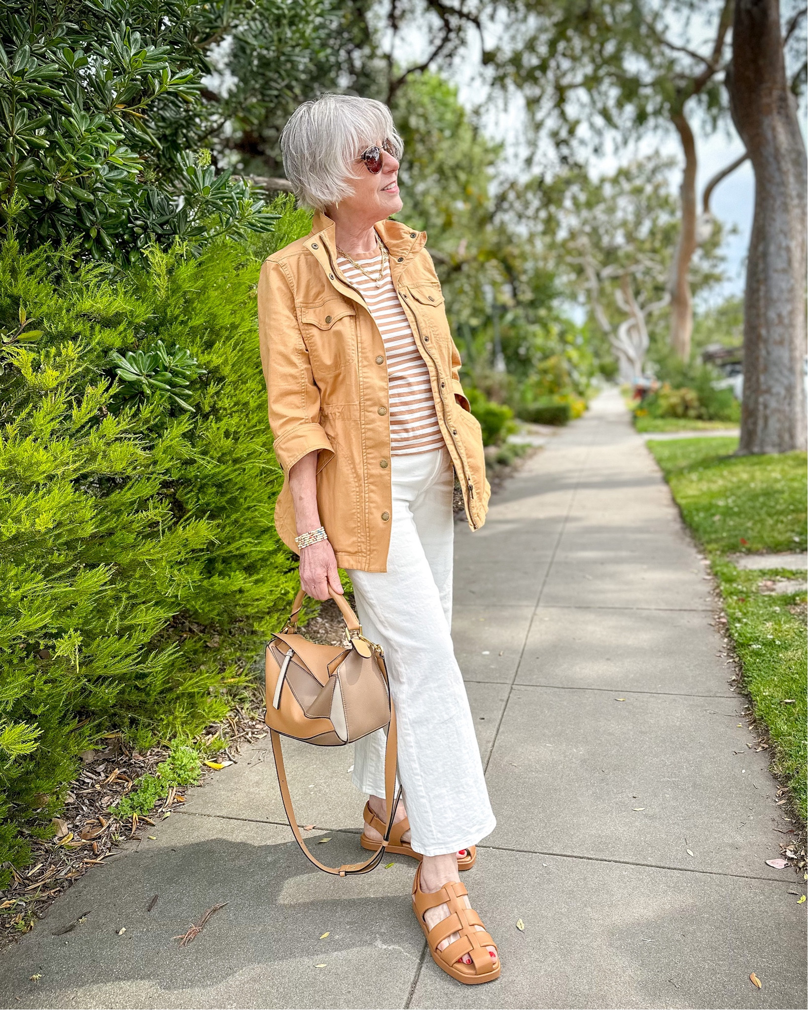 Summer neutrals with white jeans and a striped tee  

#LTKSeasonal #LTKstyletip