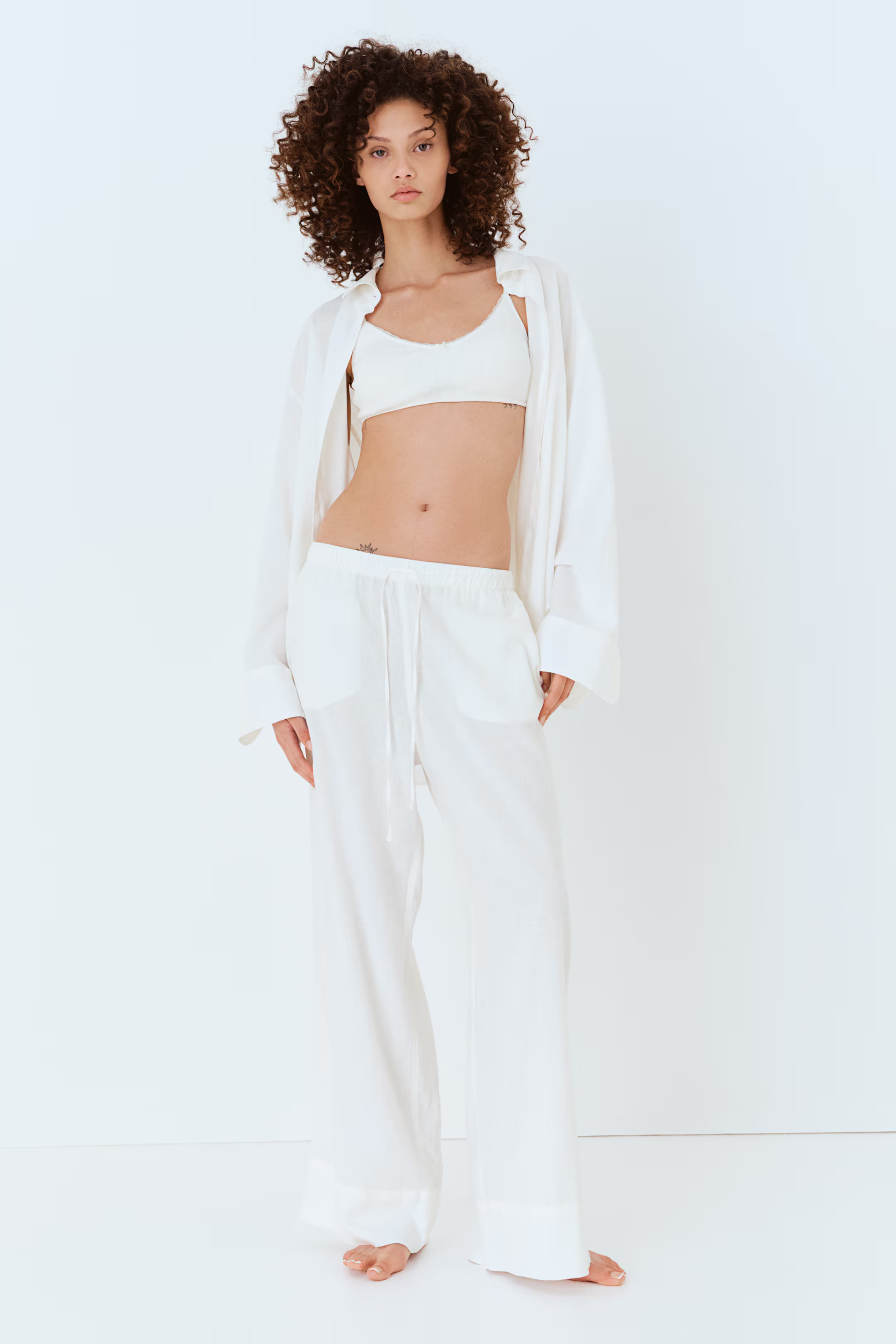 Wide linen-blend trousers - White - Ladies | H&M GB | H&M (UK, MY, IN, SG, PH, TW, HK)