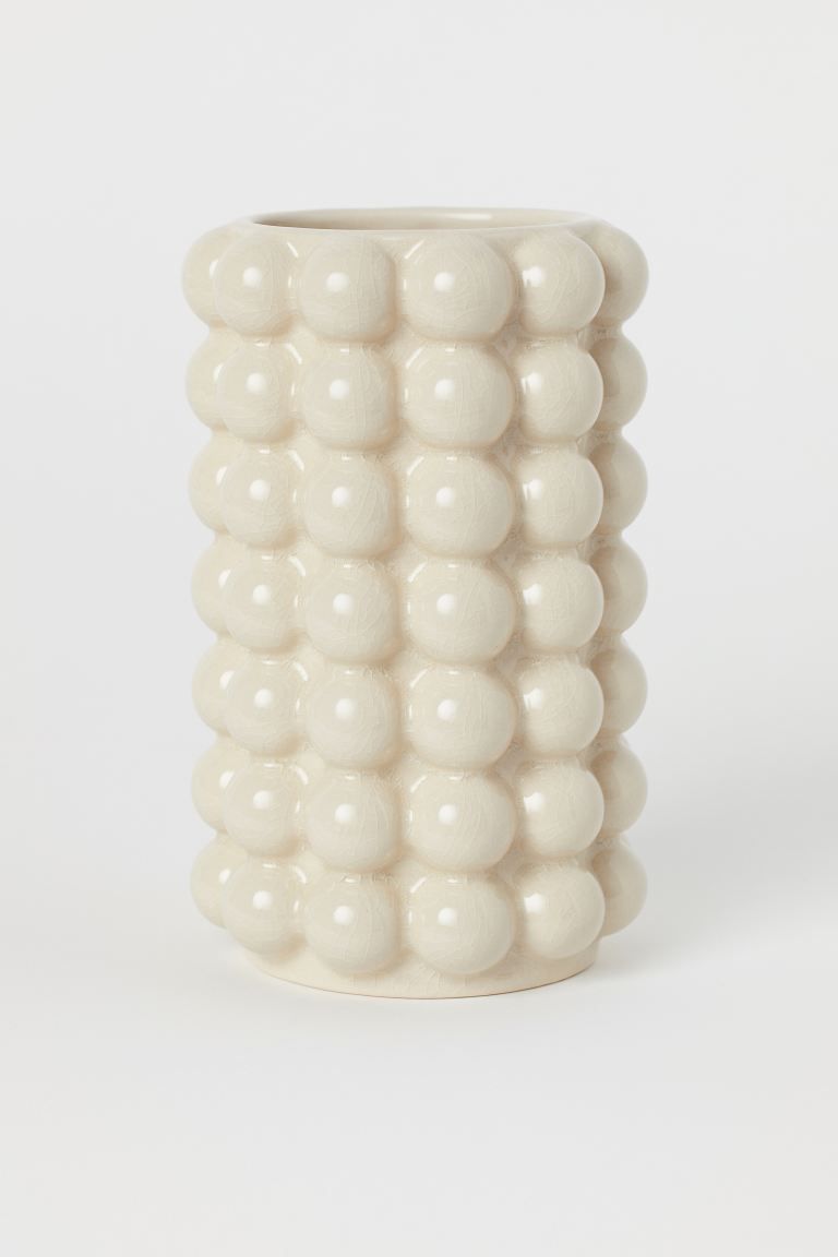 Tall vase in glazed stoneware with a bubbled finish. Inner diameter 3 1/2 in., height 8 1/2 in. | H&M (US + CA)