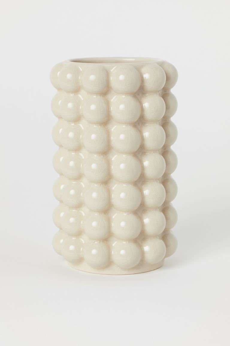 Tall vase in glazed stoneware with a bubbled finish. Inner diameter 3 1/2 in., height 8 1/2 in.Co... | H&M (US + CA)