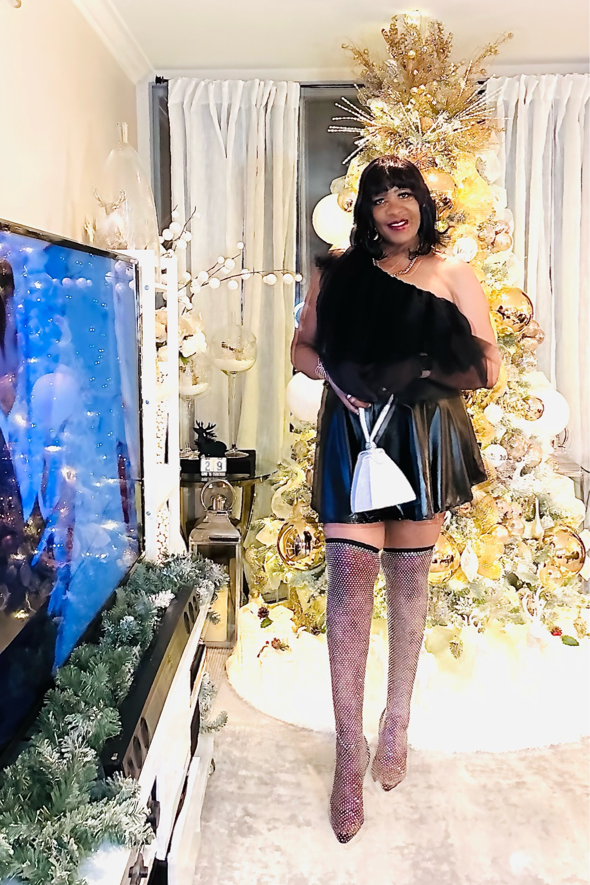 Holiday Outfit. Leather Mini Skirt. organza off the shoulder top. Rhinestone thigh, high boots

#LTKHoliday #LTKshoecrush #LTKSeasonal