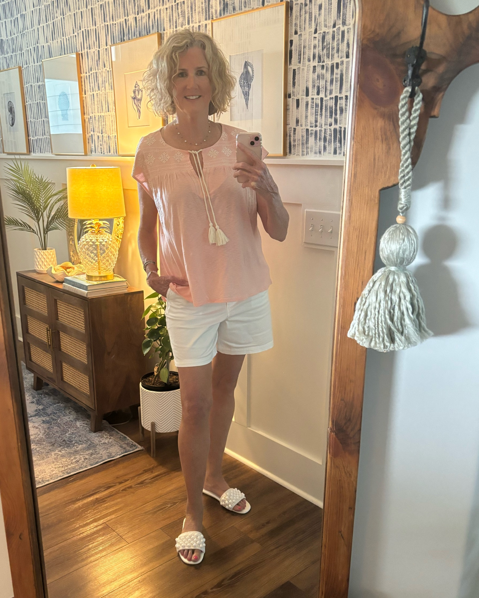 This top is a peachy pink and body cut, perfect if you have a tummy. Looks good left out or tucked

#LTKSeasonal #LTKOver40