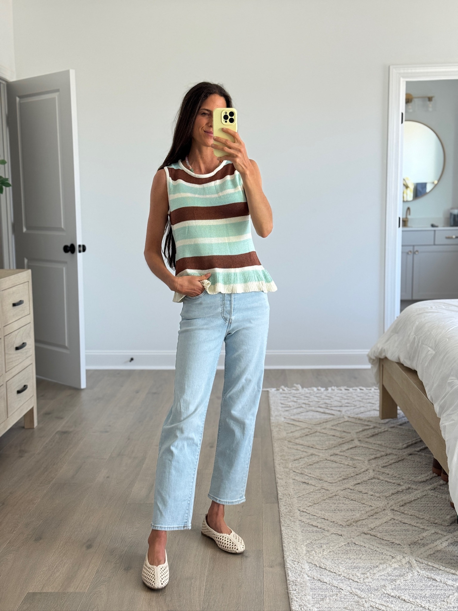 The perfect elevated casual outfit. Striped sleeveless knit top with light wash straight leg jeans and neutral flats. Easy, polished, and still super comfortable for everyday wear, errands, or a casual lunch.

#LTKSeasonal #LTKdayinmylife #LTKootd