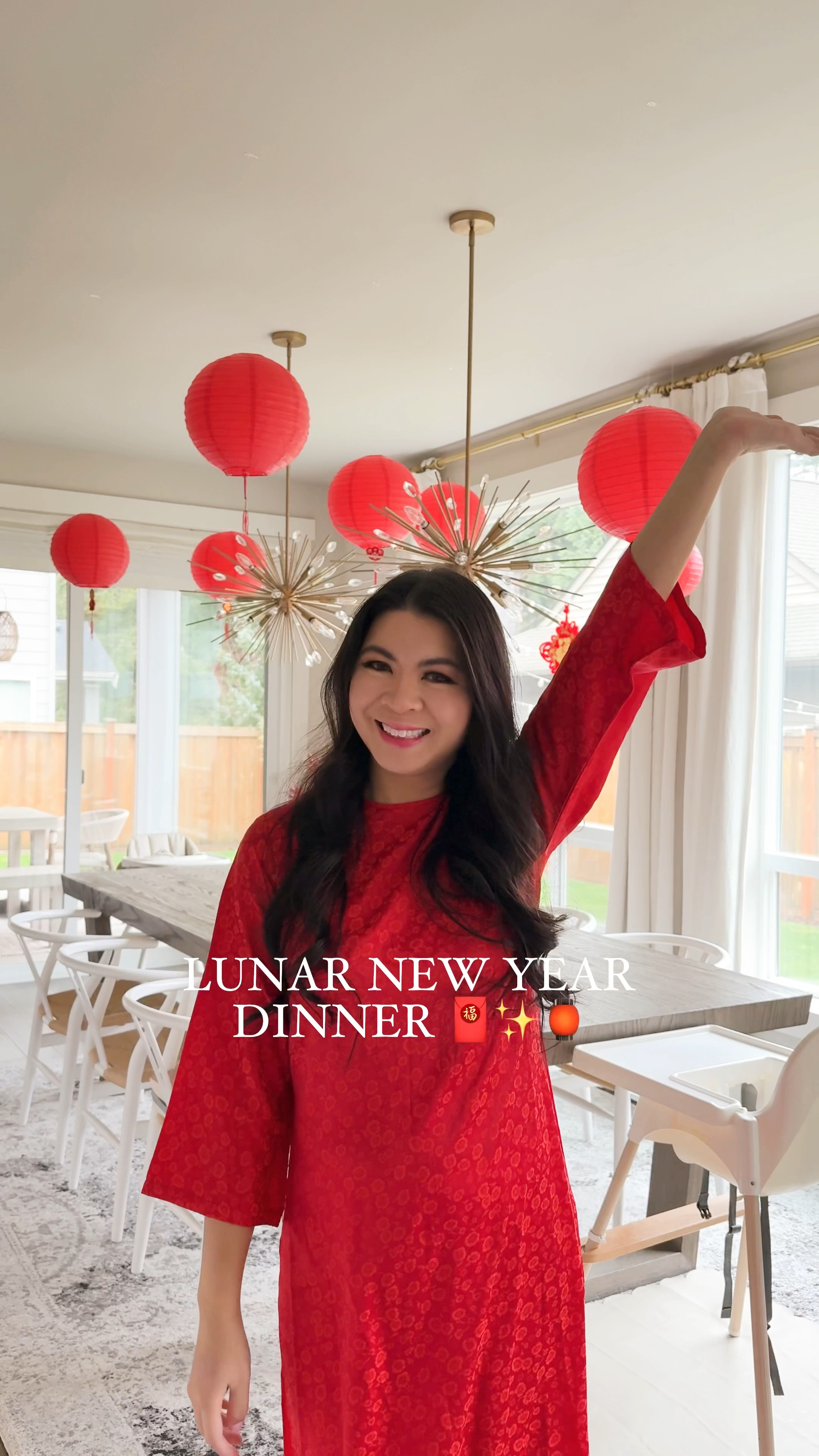 Dining room decor, lunar new year or Tết decorations with red lanterns, knots, and Vietnamese food, ao dai