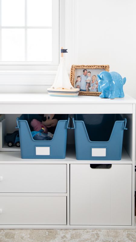 Toy storage unit with blue storage bins for boys bedroom

#LTKkids #LTKhome