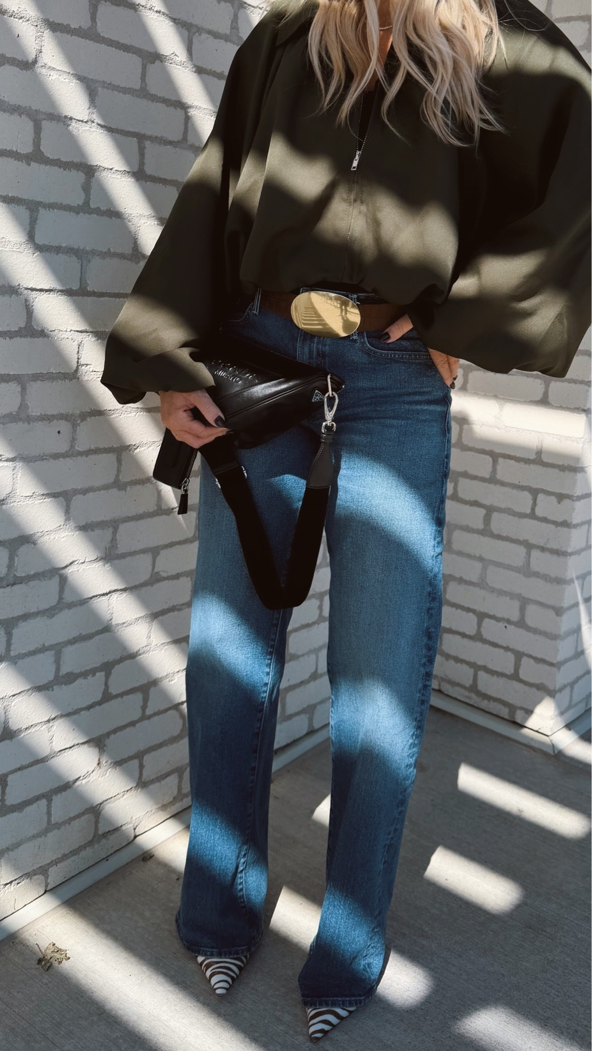 Date night, but make it fall 🤎🍸 This Amazon top instantly dresses up denim, and the zebra heels are giving the trending animal print moment I’m seeing everywhere right now. Add a statement belt + black bag and you’re out the door! 🦓✨

Fall date night. Jeans. Over 40.

#LTKOver40 #LTKSeasonal #LTKootd