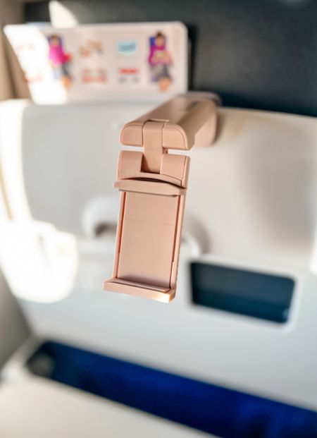 This is such a handy way to be able to use your phone on planes that don’t have a screen built in! ✨🛫

#LTKtravel #LTKfindsunder50