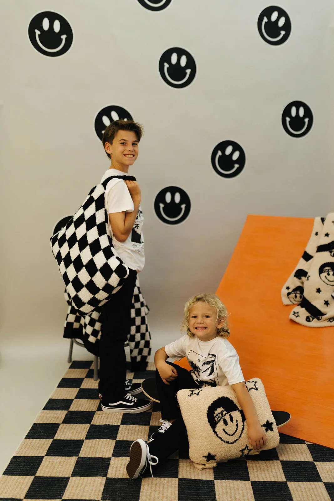 Black Check Wristlet Quillow (50*60) | Staykation