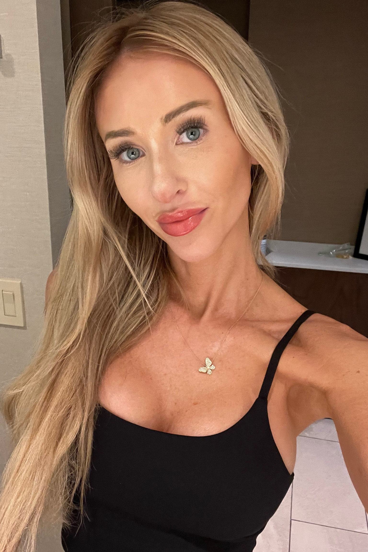 Black workout top  Amazon dupe for Lululemon align tank wearing small and my favorite gold diamond butterfly necklace :)

#LTKFitness #LTKFindsUnder50 #LTKActive