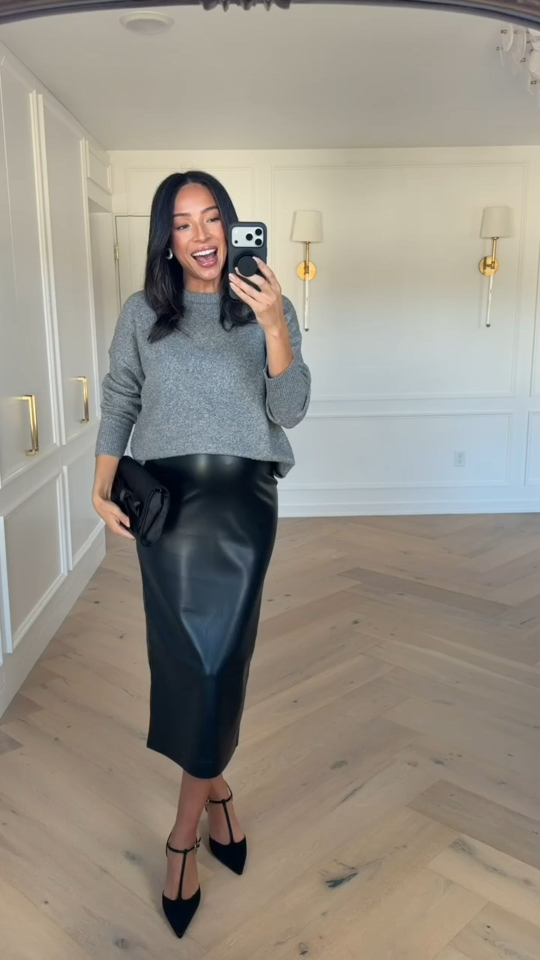 Express is 25% OFF!! I love this faux leather midi skirt. It is so cute & comfortable - would be perfect for a holiday dinner! Wearing size M grey sweater and size S midi skirt 

Fall outfit 
Fall fashion 
Dinner outfit 
Date night outfit

#LTKBump #LTKHoliday #LTKStyleTip