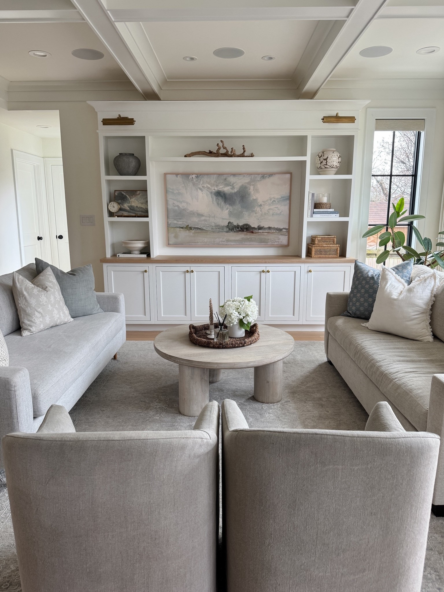 Modern coastal living room design. Entertainment center. Shelf decor 

#LTKmomlife #LTKHome