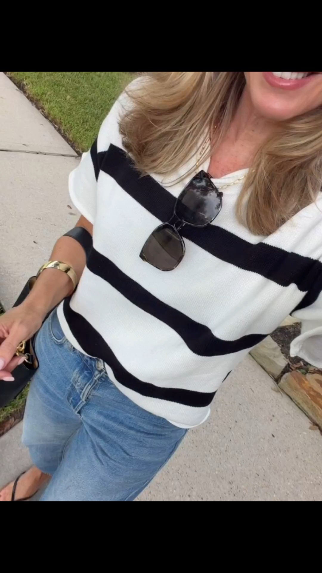 Black and white stripes with denim will always be a favorite of mine! This short sleeve knit sweater has that classic look I love, and the relaxed shape makes it easy to wear without tucking. Perfect for those warm fall days when you want a sweater but aren't ready for heavy layers.
black and white striped sweater, short sleeve knit sweater, striped fall top, sweater and jeans outfit, no tuck sweater, casual fall outfit, lightweight fall sweater, classic striped top, transitional fall outfit, fall outfits over 40, everyday fall style, HauteandHumid
