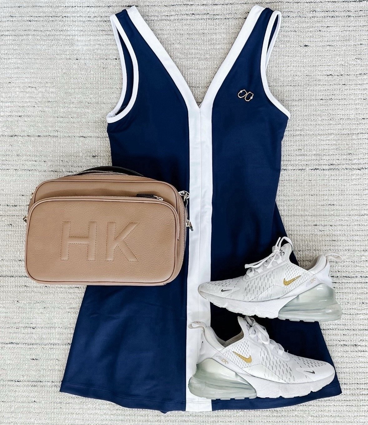 Spring outfit with navy athletic dress dtyled with sneakers for a chic and casual look. On sale for 30% off! 

#LTKSaleAlert #LTKStyleTip #LTKSummerEdit