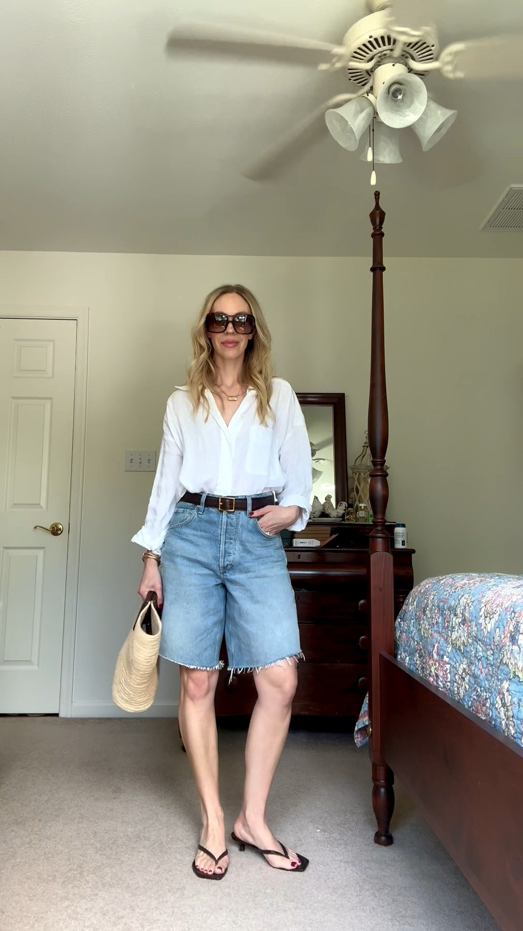 Classic summer outfit with oversized linen shirt, denim bermuda shorts, chocolate brown leather belt, kitten heel sandals, straw tote bag

#LTKSeasonal #LTKOver40 #LTKSaleAlert