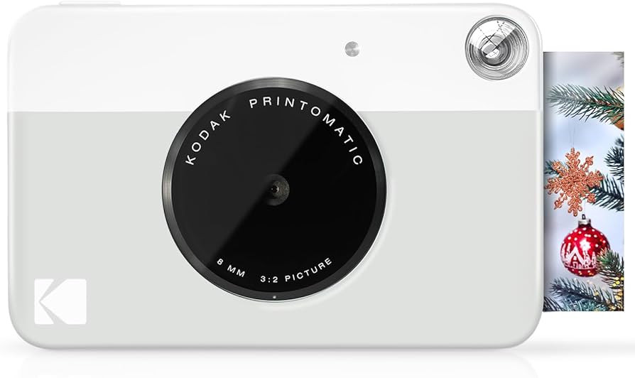 KODAK Printomatic Digital Instant Print Camera - Full Color Prints On ZINK 2x3" Sticky-Backed Pho... | Amazon (US)