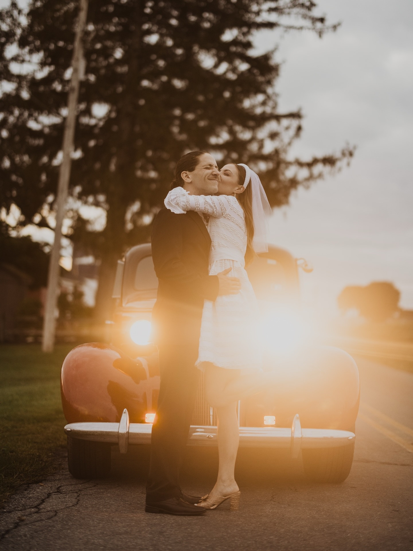 “We parked on W. Main Street across from Pop”s Malt Shoppe to split a milkshake. 

Laura was so joyous + quick to capture each genuine moment of fun and connection. Cars honked.  Onlookers cheered out “congrats”.

Uncle Charlie + Aunt Gail were patiently on the sidelines, assisting with props + bts videos. It truly felt like we were in a movie. 

We caught the sunset at a nearby farm Charlie + Gail scouted the evening prior. There were even cows mooing in the background! Not even an hour before these photos were taken the heavens were raining down. Can you believe it!

I think my favorite moment was Laura coaching us to “act like we’re 16 years old“ but the reality was there was no acting necessary. Ryan really does make me feel like I am a preteen -  giddy in love. We have to grow old but we do not have to grow up. We dance in the kitchen and take photos to capture our story and love in the present moment because truly that’s all that we have - is this moment. The now.”

Full feature on our blog ✨

vintage styling: @lucid.ladybug
photographer: @laurabriggsphoto
1960s wedding dress: contessa bridals curated by @karnetcreative

#vintage #engagement #vintagecar #vintagewedding #vintagestyle #weddingphotography #weddinginspo

#LTKStyleTip #LTKWedding #LTKSeasonal