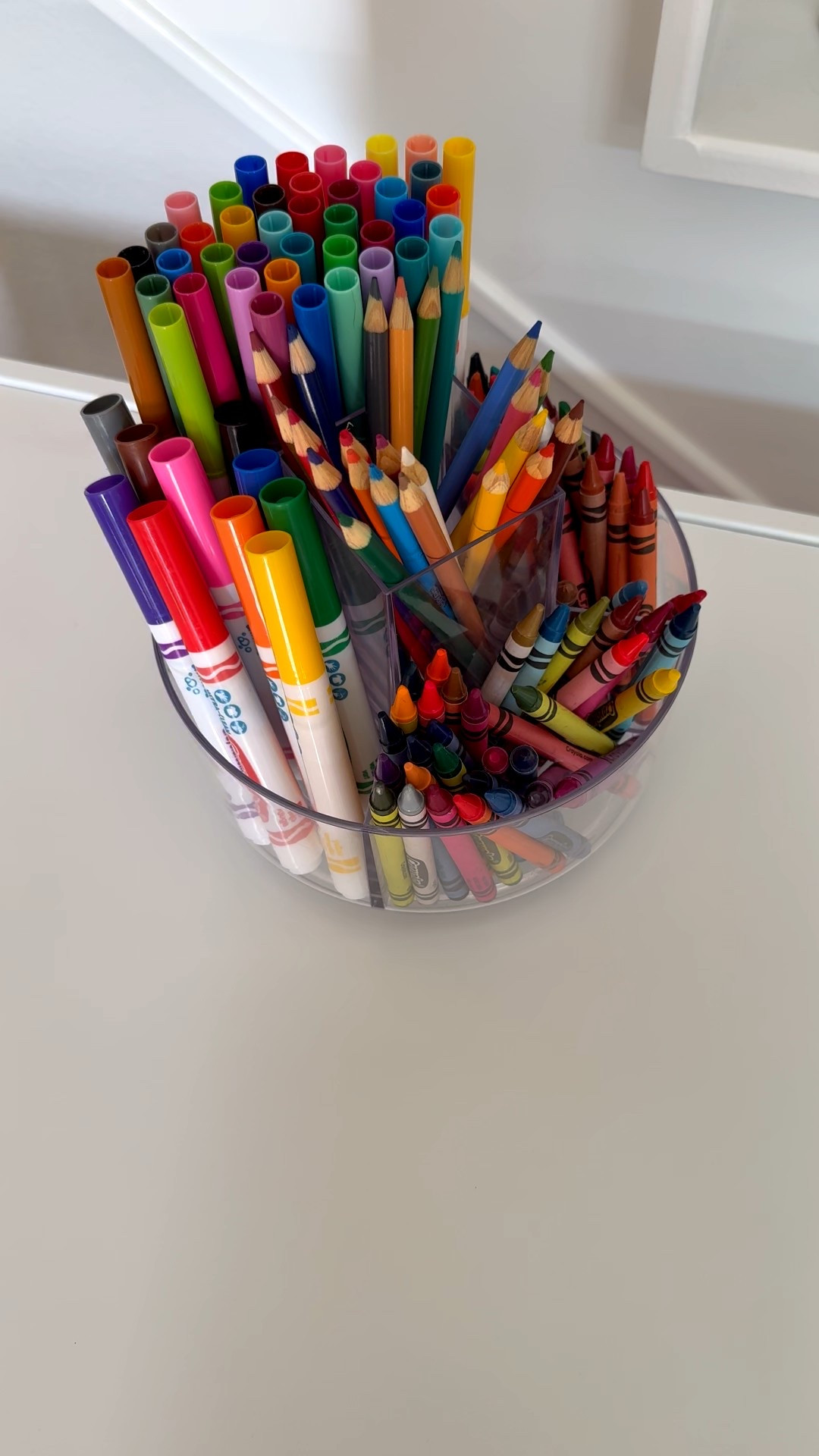 An easy way to display your kids crayons, markers, and colored pencils for coloring time in this lazy Susan spinner. #kids #playroom 

#LTKBaby #LTKKids #LTKFamily