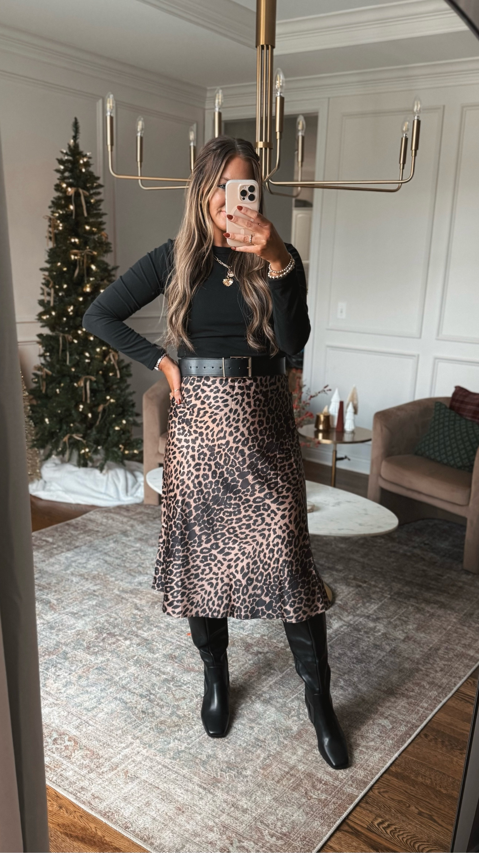 How cute is this Amazon skirt?! This whole look would make a perfect Thanksgiving outfit, holiday outfit or date night outfit! I’m wearing it with my go to winter staple bodysuit and boots!

#LTKHoliday #LTKStyleTip #LTKFindsUnder50