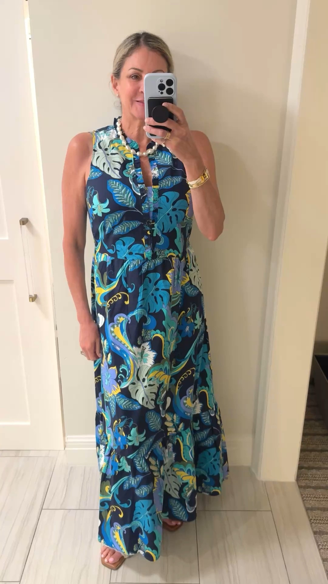 Resort Wear. I like to pack my oversized pearl necklace and sparkle slides to elevate any print dress for dinner at the resort.

#LTKdayinmylife #LTKvlog #LTKOver40