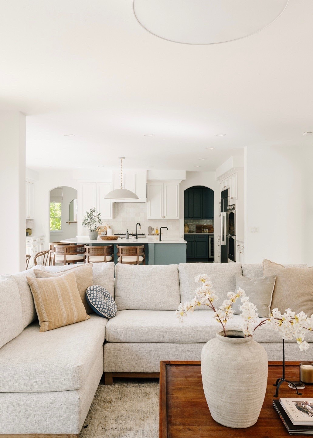 Living room with reclaimed wood coffee table, vintage inspired rug and walnut kitchen stools. 

Living room, rug, stool, bar stools

#LTKHome