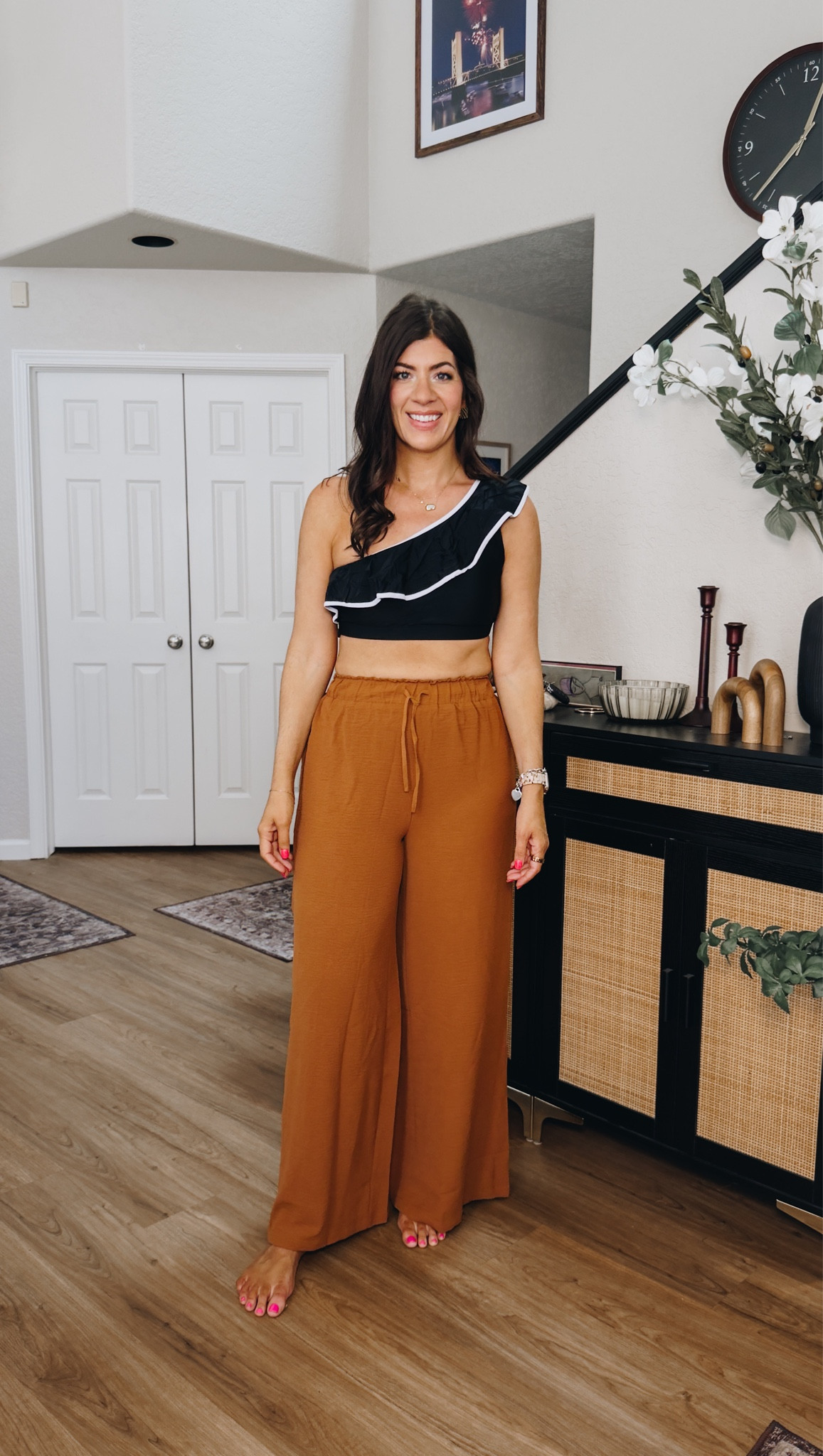 In a large suit and large wide leg coverup pants 

#LTKSaleAlert #LTKMidsize #LTKSwim