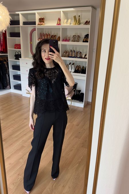 A black lace top and black trousers make a simple night out outfit that never looks out of place. A dinner with friends, a romantic date or a cocktail party - you can wear it effortlessly. It’s a quiet luxury fit that flatters everybody #black #partyoutfit

#LTKwedding #LTKstyletip #LTKSeasonal