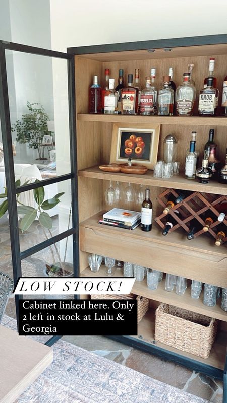 My bar cabinet is available at Lulu and Georgia but there are only 2 left in stock. This one is worth the splurge! 

#curiocabinet #barcabinet #homebar

#LTKSaleAlert #LTKVideo #LTKHome