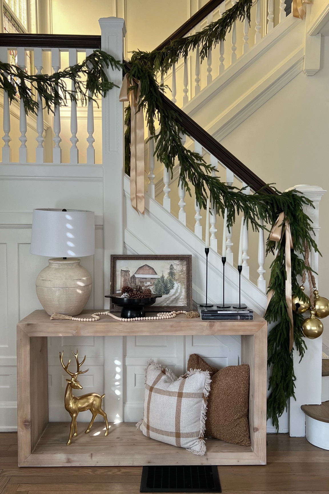 Holiday banister and console table decor! #christmasdecor #garland #holidaystyle #christmas

#LTKhome #LTKSeasonal #LTKunder100