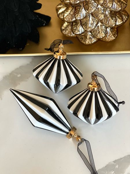 These are some of my favorite ornaments on my tree! Hurry though these did not last long last year!

Black-and-white ornaments, Christmas ornaments, Christmas tree, Christmas decor, home decor, living room, MacKenzie Childs, black and white, black Christmas, white Christmas, white living room, fall decor, modern, transitional

#LTKHoliday #LTKhome #LTKSeasonal