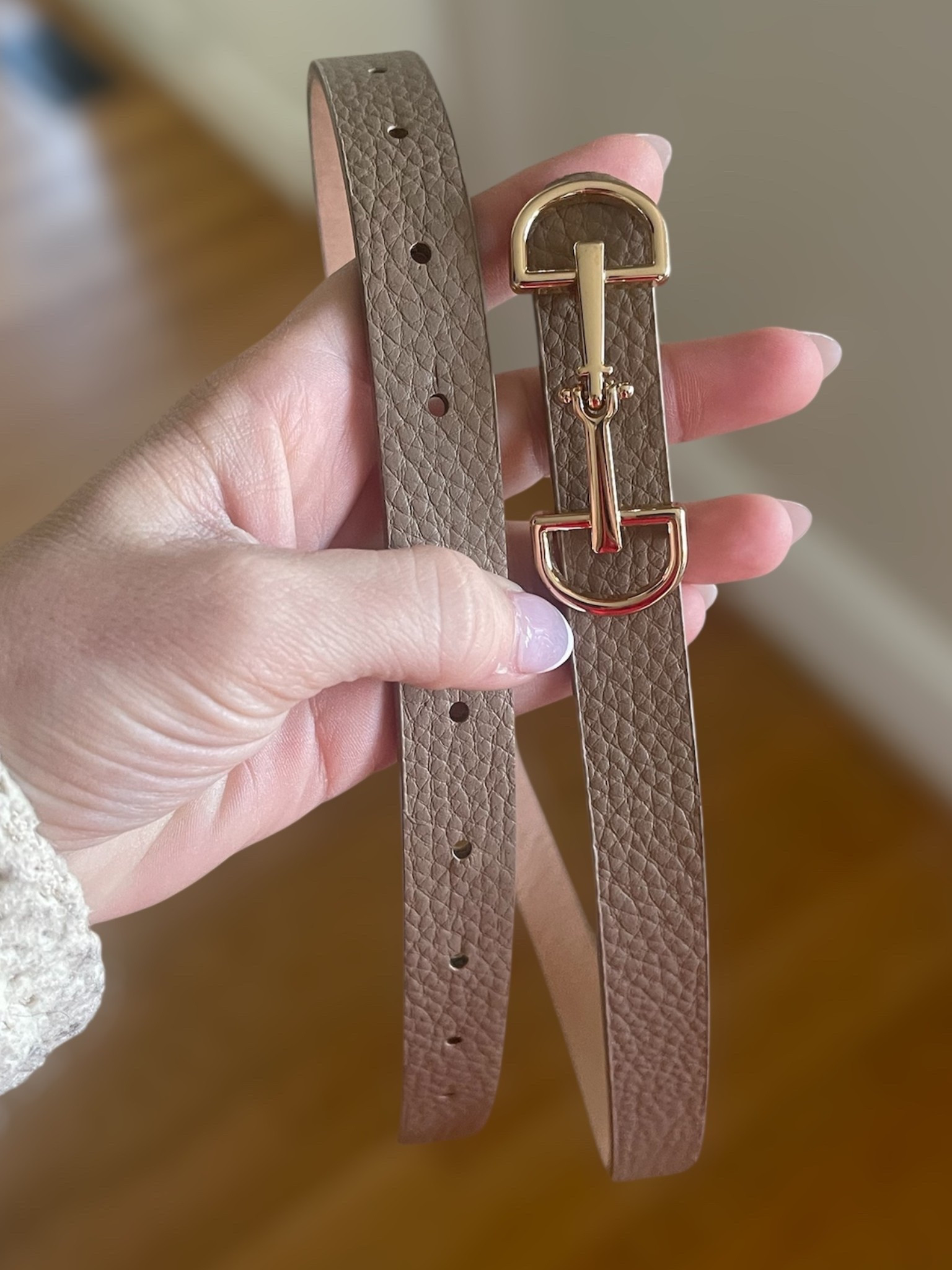 Classic Horsebit Skinny Belt (Neutral Closet Staple) 🤎✨

Found this chic horsebit skinny belt at Alley Anne’s, but I’ve linked very similar styles from other retailers so you can easily recreate the look. The neutral cognac/taupe tone with gold hardware is such an easy way to elevate everyday outfits — perfect with denim, trousers, sweater dresses, or even layered over a blazer. I love a skinny belt like this for adding a polished, timeless touch without overpowering an outfit. A great classic accessory that works year-round and pairs effortlessly with both casual and dressier looks 🤍🐎

horsebit belt, skinny leather belt, neutral women’s belt, cognac belt, gold buckle belt, classic accessories, equestrian style belt, timeless wardrobe staples, affordable fashion finds, everyday outfit accessories

#LTKFindsUnder100 #LTKGiftGuide #LTKFindsUnder50