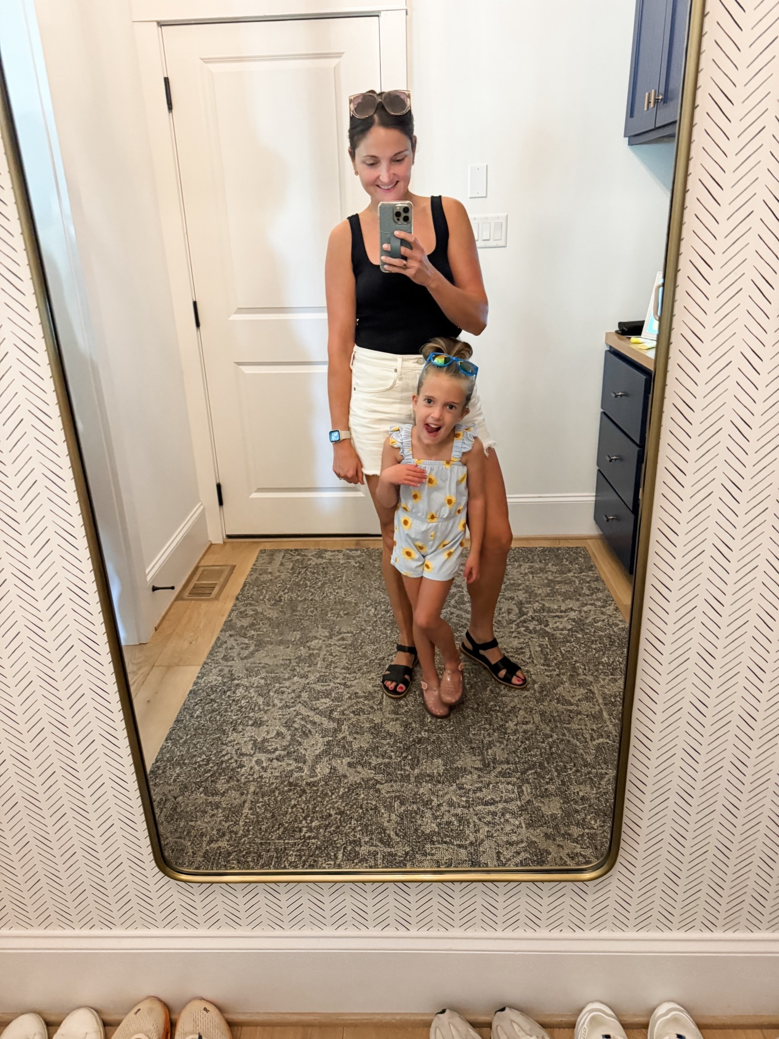 Ready for putt putt with with my girl. These are the Agolde Parker long shorts in white. Wearing a size 28. Liv’s romper is from Old Navy. 🌻 