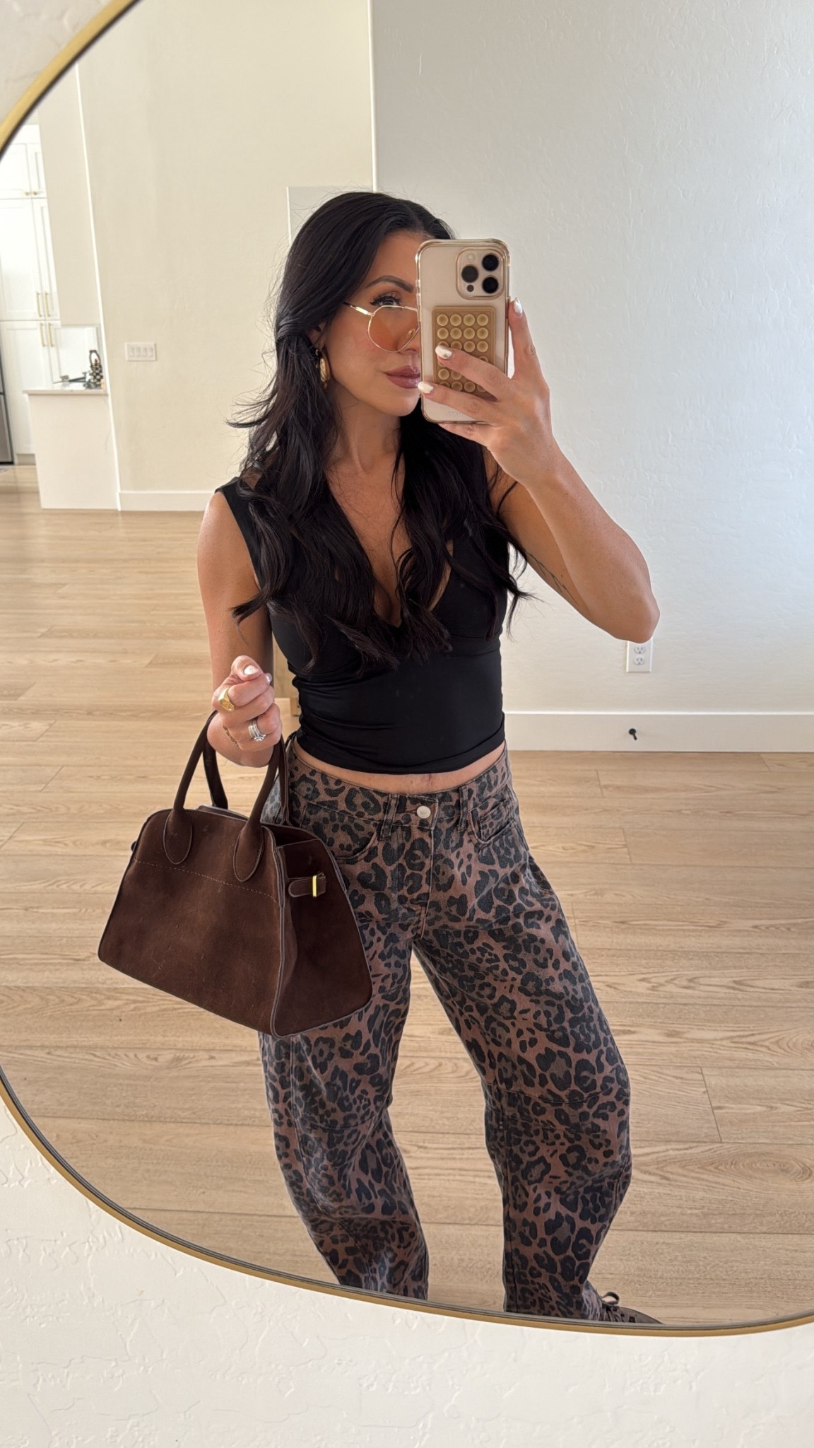 Today’s Amazon outfit! 
Light brown aviator sunglasses 
Black plunge top size small 
Cheetah jeans size small
Tote bag size small
Adidas samba 


#LTKActive #LTKSeasonal #LTKStyleTip