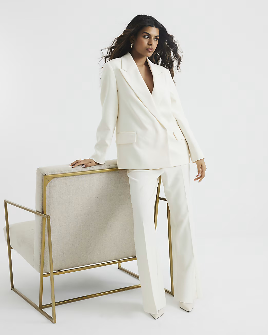 Petite Cream Slim Flared Trousers | River Island UK & IE